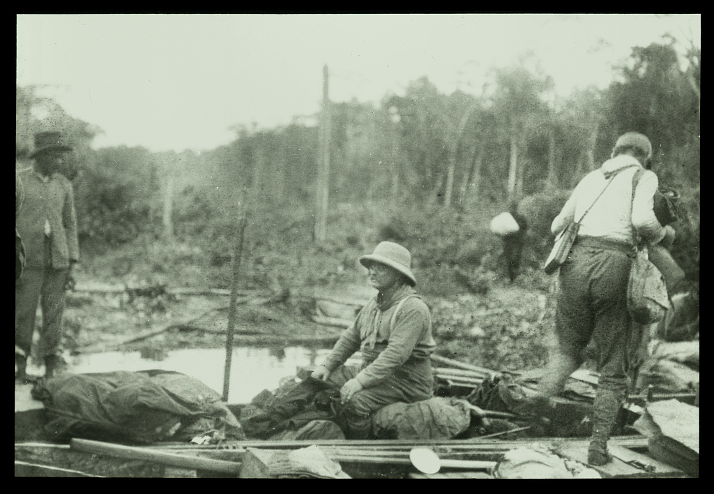 Roosevelt seated in a boat during his Brazilian expedition.