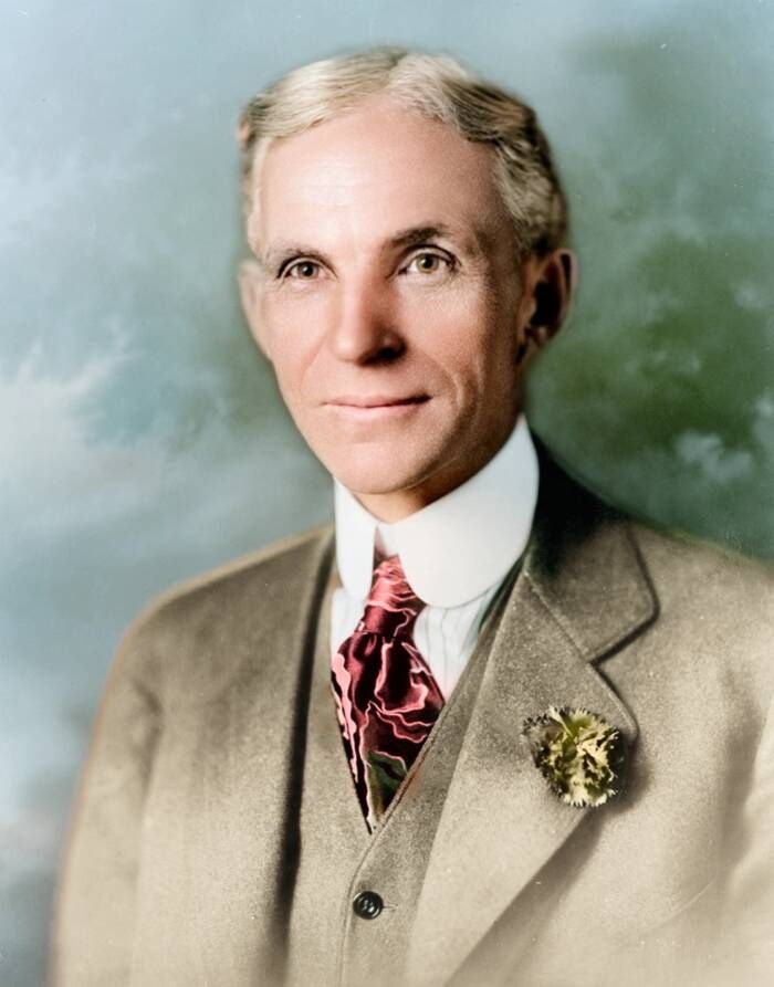 Portrait of an older Henry Ford in a light suit and patterned tie.